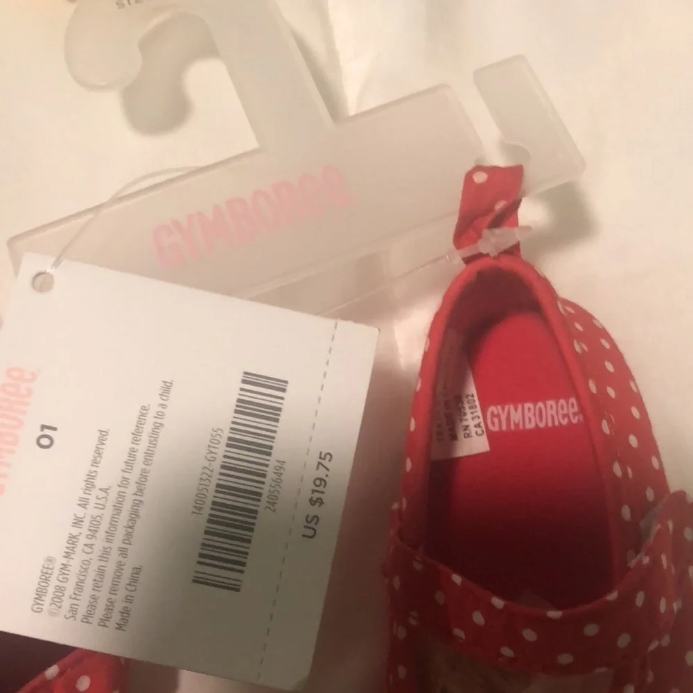 NWT set of 2 baby onesies and size one baby shoes